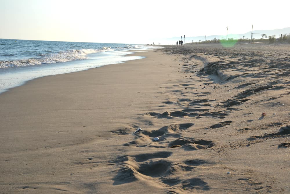 Footsteps in sand AC Hotel Gava Mar - a Barcelona hotel by the beach