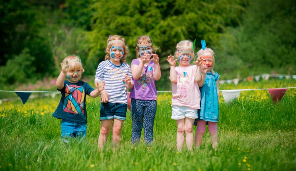 Group of children enjoying Wild Week at the Lost Gardens of Heligan in Cornwall