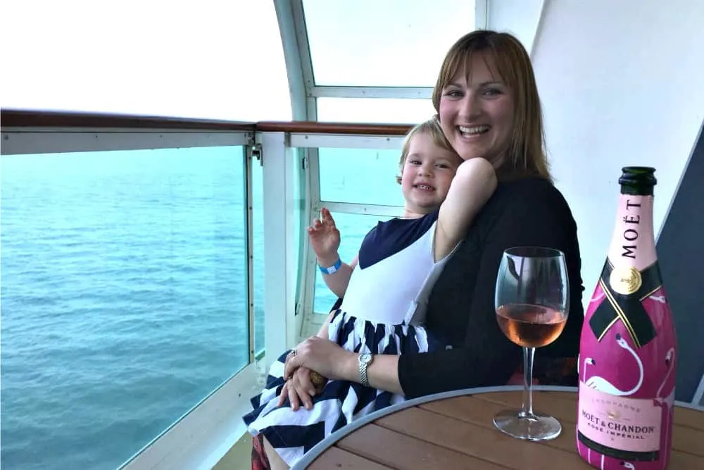 Tin Box Traveller and Baby on cabin balcony - Navigator of the Seas with kids