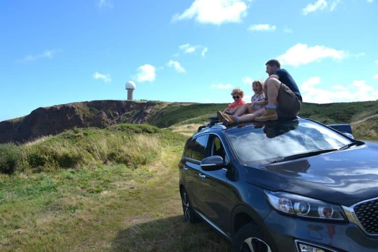 Sitting on car at Hartland Point Devon - Harland PointBest ideas for entertainment during a long car journey with young children