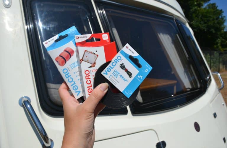 VELCRO® Products in front of caravan - caravanning accessories to organise and tidy your caravan