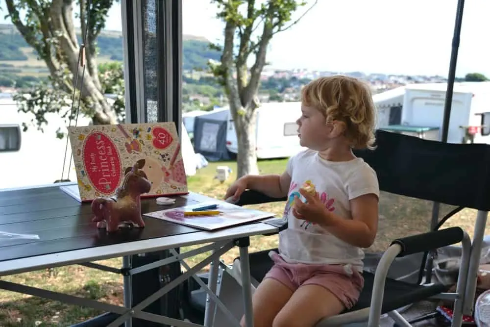 East Devon campsite - Manor Farm Caravan & Camping Site, Seaton Devon - Baby in awning
