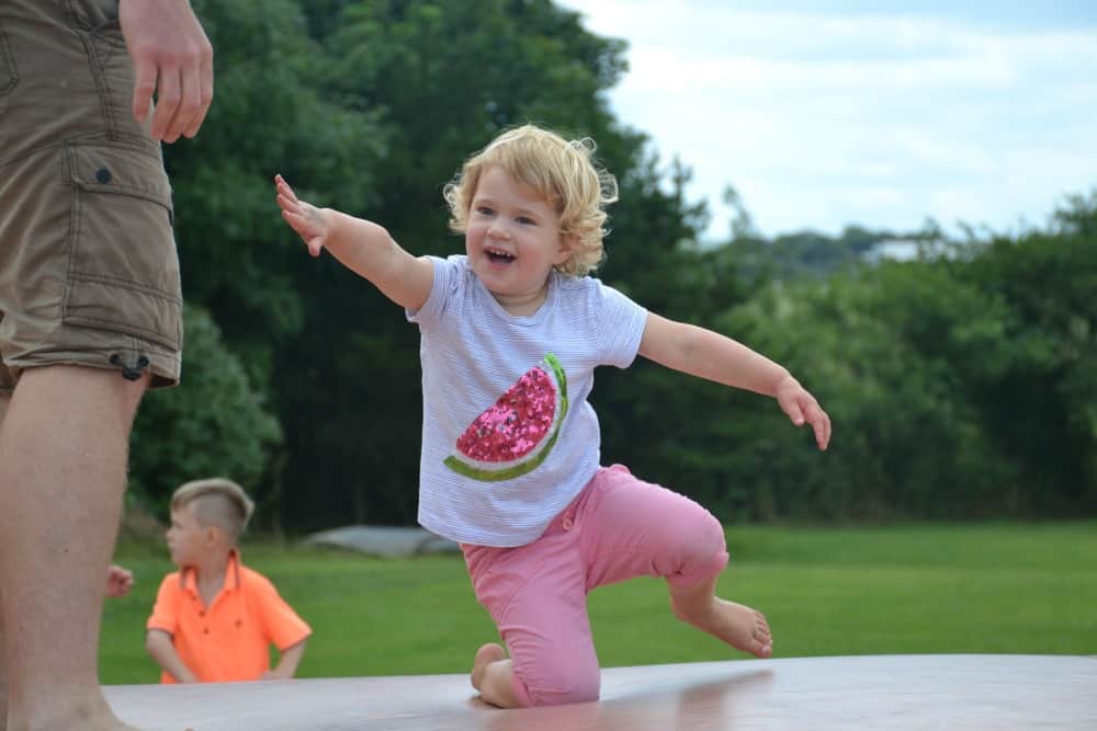 Baby on the Jumping Jupiter pillows - The Milky Way Adventure Park - a Devon theme park