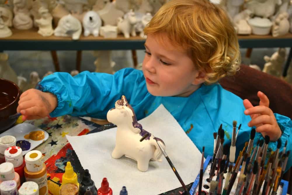 Baby painting pottery - The Milky Way Adventure Park - a Devon theme park