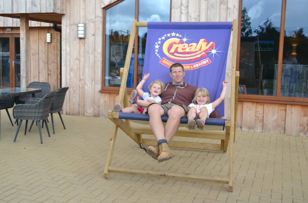 Tin Box familty in Crealy Meadows chair - camping at Crealy Adventure Park