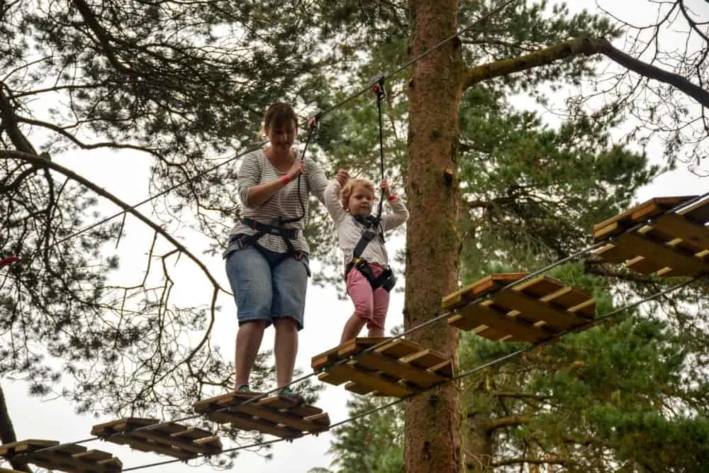 Tin Box family on Junior Go Ape course at Go Ape Exeter: Tree Top Junior Adventure at Haldon Forest
