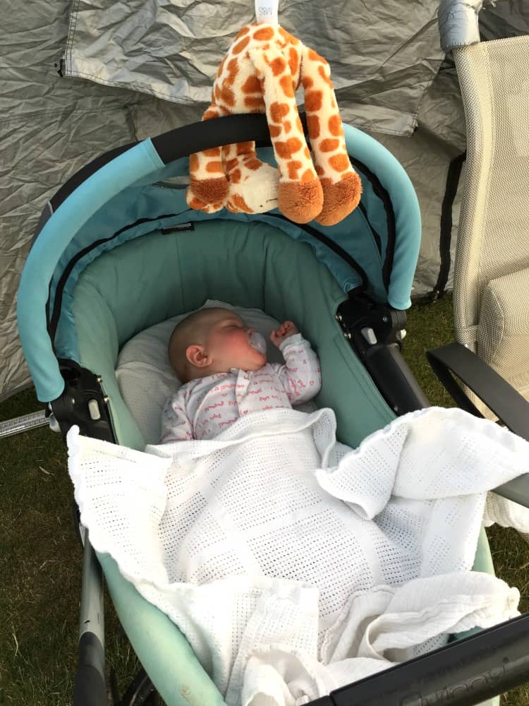 Baby in carry cot - caravanning with a baby