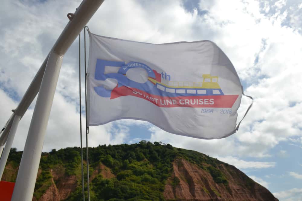 Ship flag Pride of Exmouth Stuart Line Cruises boat trip from Sidmouth