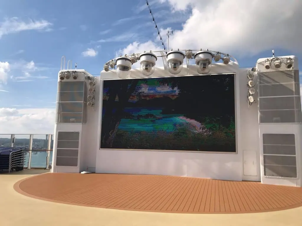 Aft pool area big screen - Norwegian Breakaway ship tour: NCL family cruise