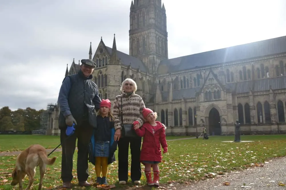 Tin Box family outside Salisbury Cathedral - Salisbury with kids - a short break in October half term