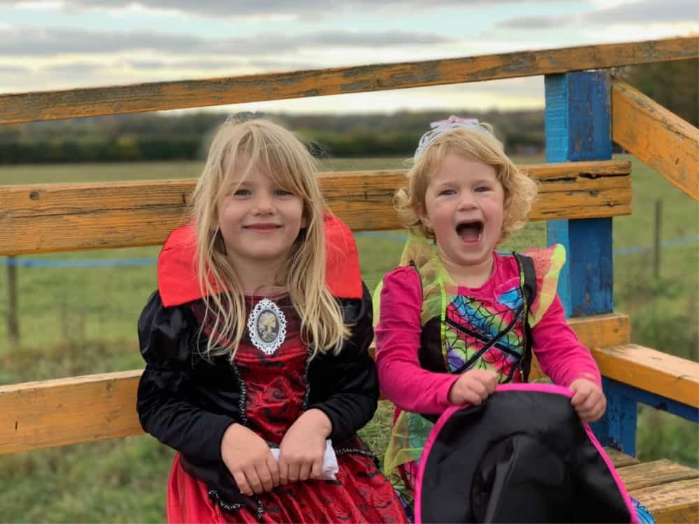 Tin Box girls on tractor ride at Cholderton Charlies - Salisbury with kids - a short break in October half term