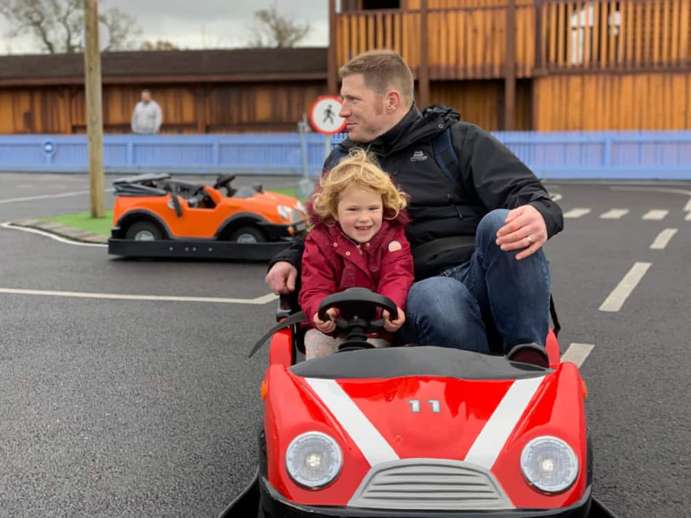 Baby driving car at The Crealy Christmas Spectacular - Devon's best Christmas day out