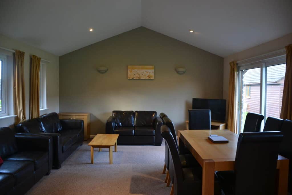 Living area in Waterside Cornwall lodge - self catering holidays in Cornwall