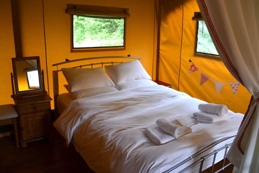 Master bedroom at Western Meadows Glamping - self catering holidays in Cornwall
