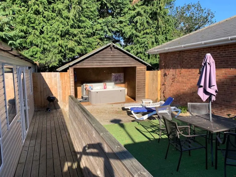 Private garden - luxury caravan with hot tub at Andrewshayes Holiday Park Devon
