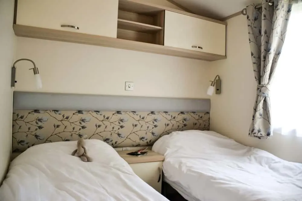 larger twin room - Luxury caravan with hot tub at Andrewshayes Holiday Park Devon