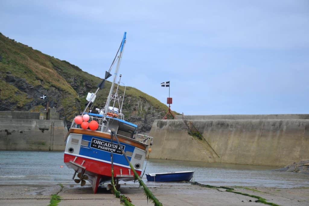 Boat in Port Issac harbour - family holidays in Cornwall