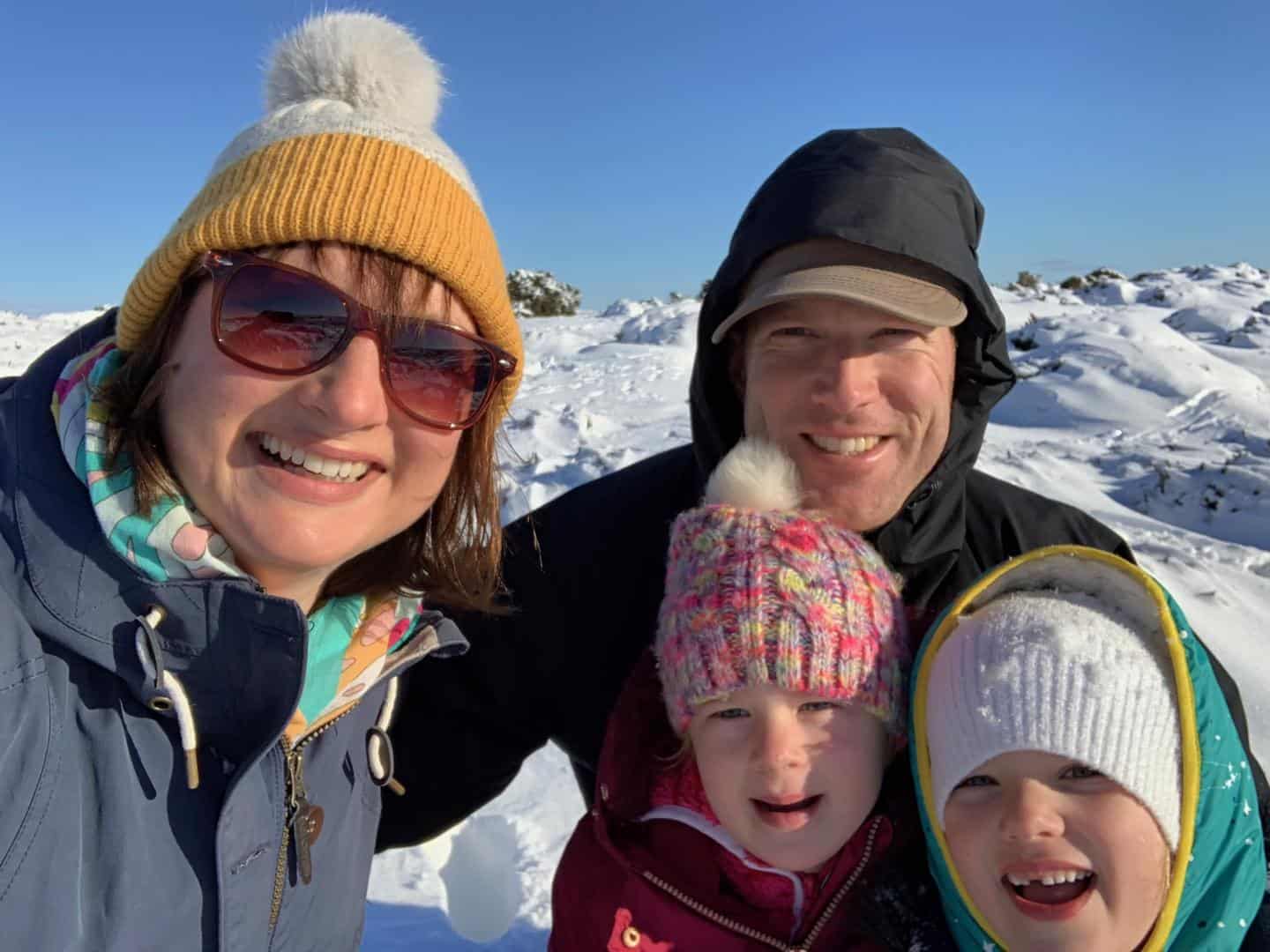 Tin Box family in the snow - tips for family holidays with kids from the Caravan, Camping and Motorhome Show