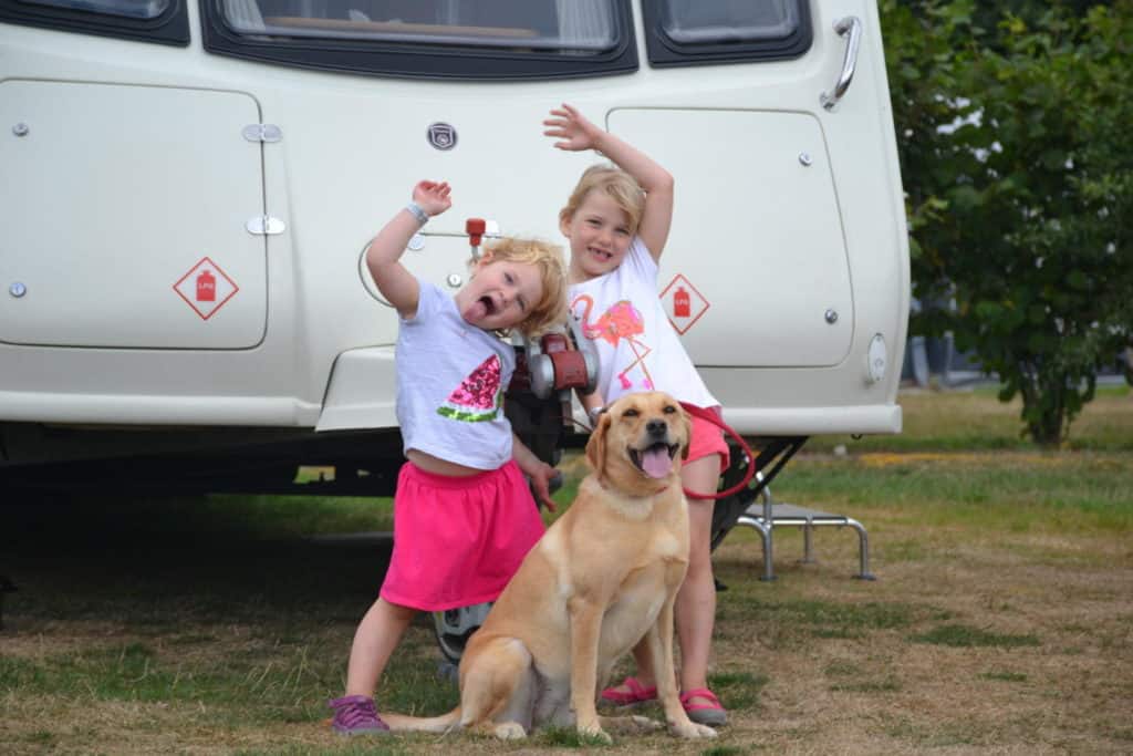 Tin Box girls and dog - tips for family holidays with kids from the Caravan, Camping and Motorhome Show