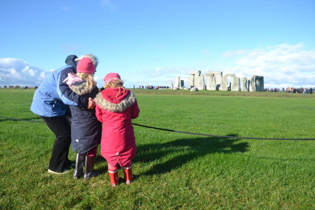 Tin Box girls at Stonehenge - tips for family holidays with kids from the Caravan, Camping and Motorhome Show