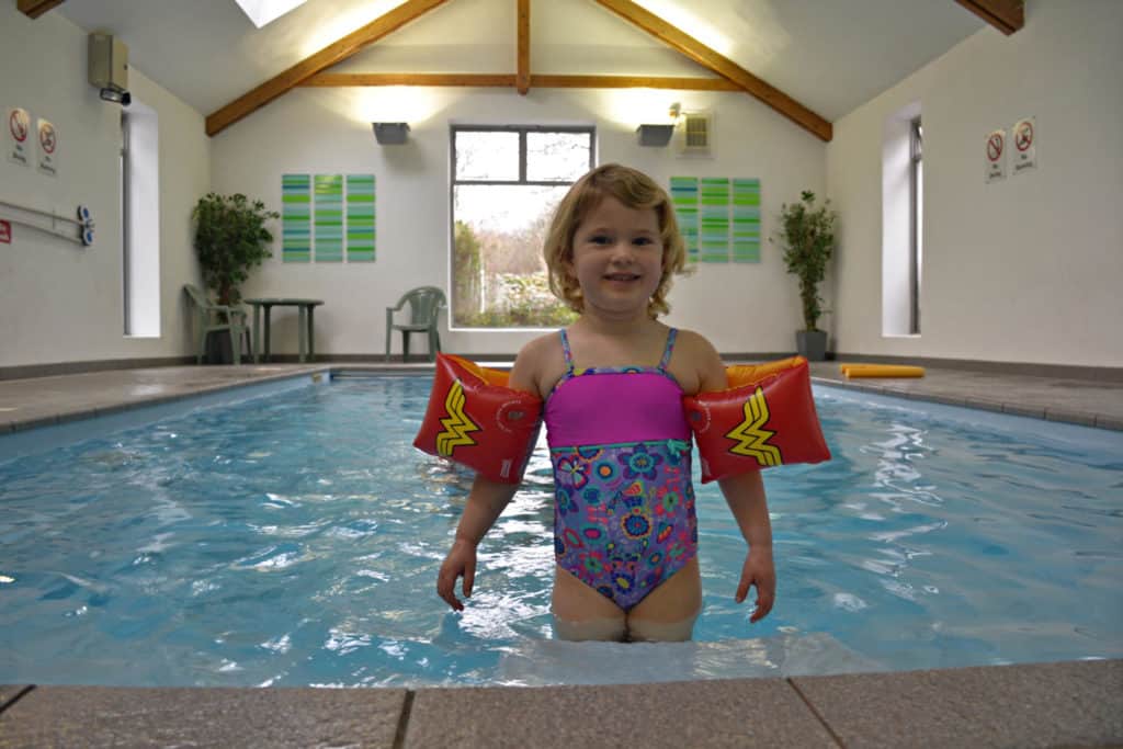 Baby in pool - The Valley Cornwall Review, luxury cottages in Cornwall