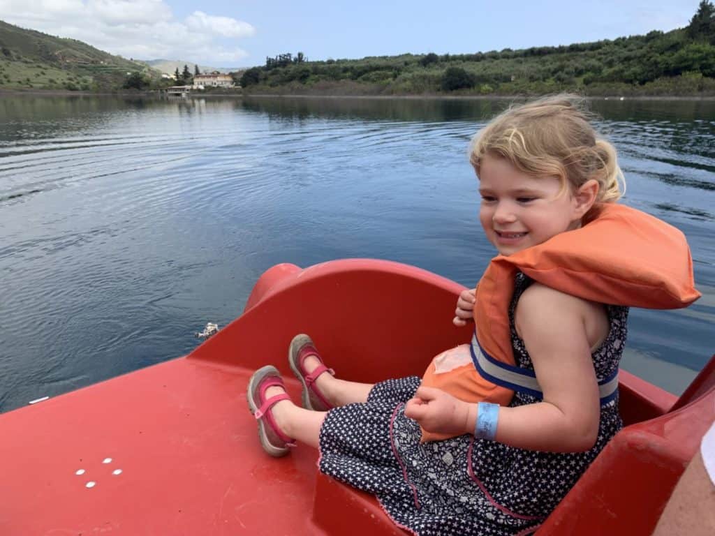 Baby on pedalo on Lake Kournas - things to do in Chania, Crete