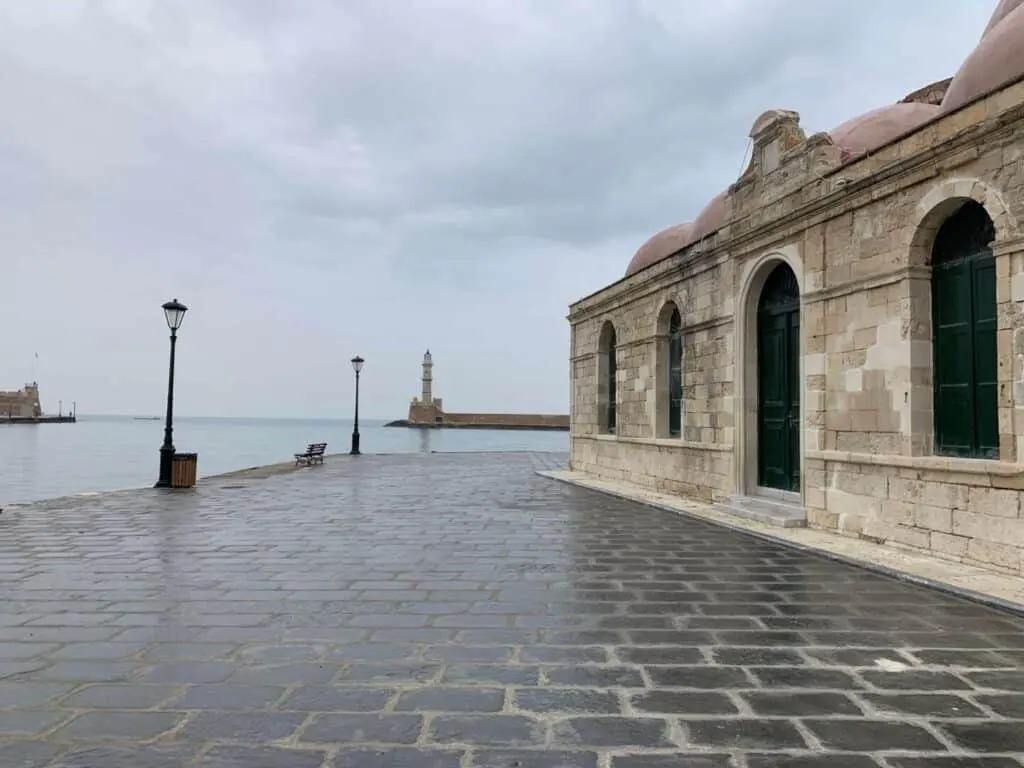 Islamic architecture on the harbour in Chania with lighthouse and harbour wall in background