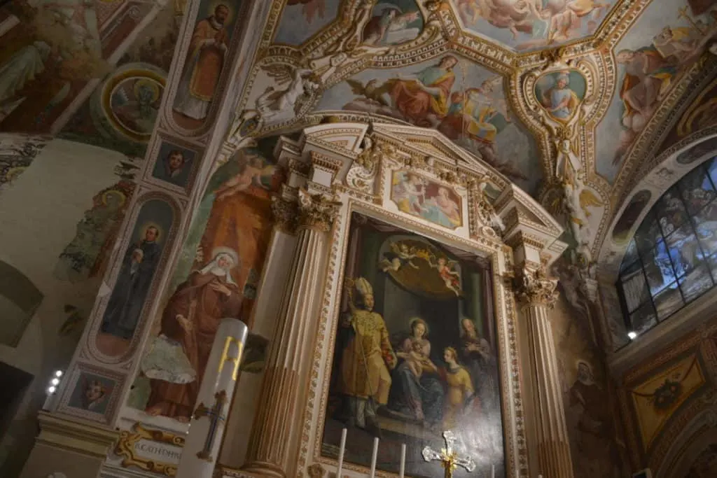 Chapel front Santa Caterina del Sasso with kids, Lake Maggiore, Italy