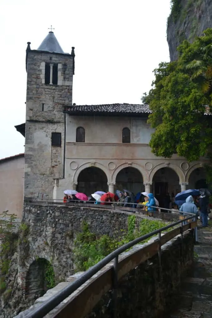 Chapel bell tower Santa Caterina del Sasso with kids, Lake Maggiore, Italy