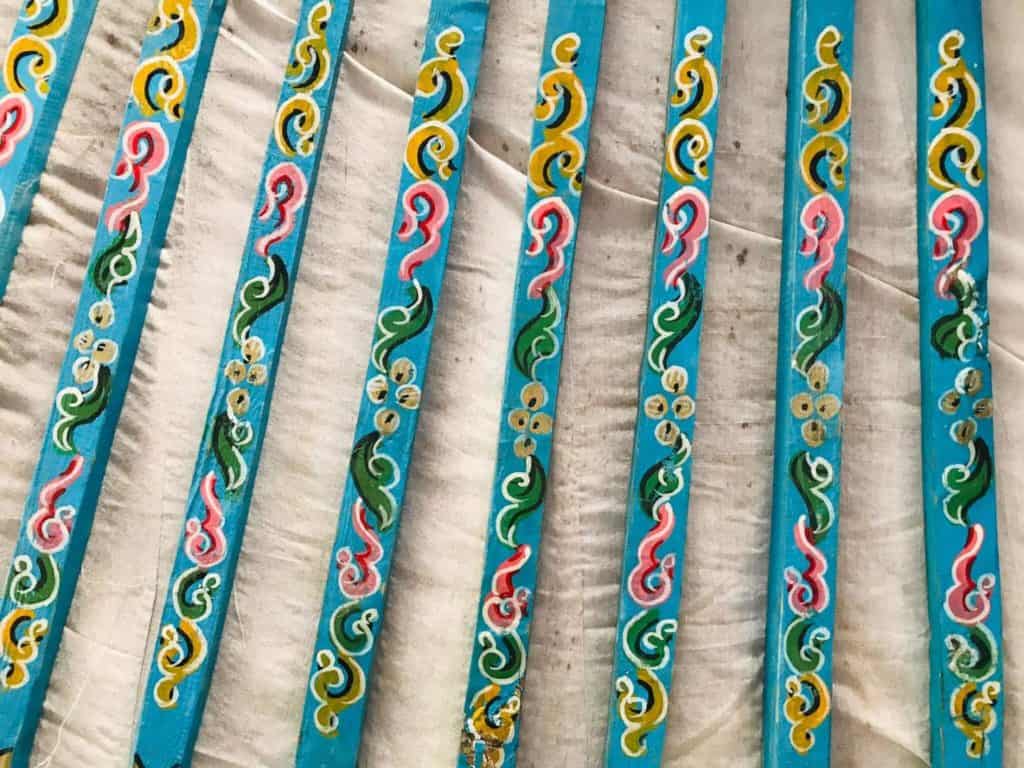 Decorated yurt poles