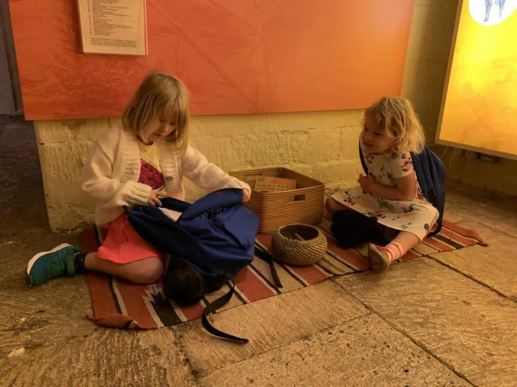 Kids using activities in museum bags