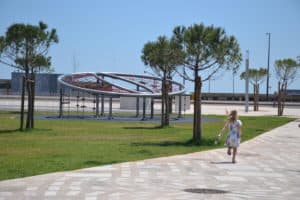 Girl running in Lisbon city park