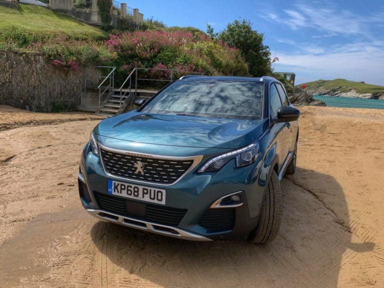 Peugeot 5008 SUV on Cornwall beach