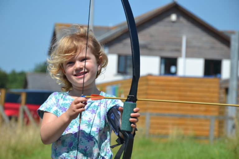 Four year old tries archery at Pembrey Country Park