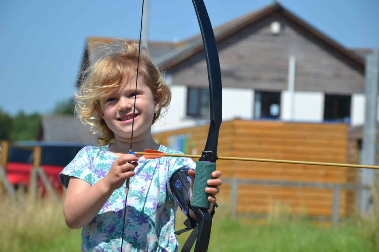Four year old tries archery at Pembrey Country Park