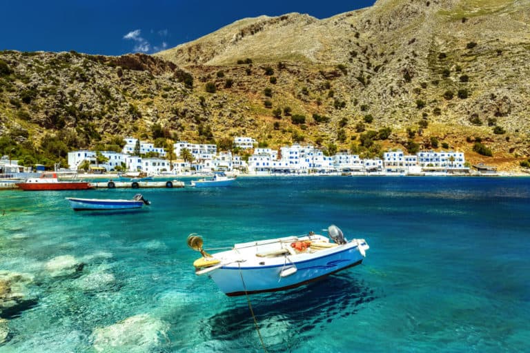 Boat in harbour in Crete