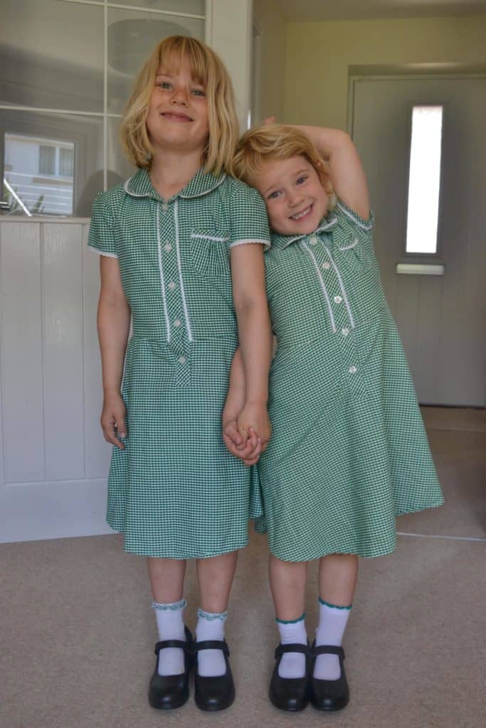 Girls standing in school uniform
