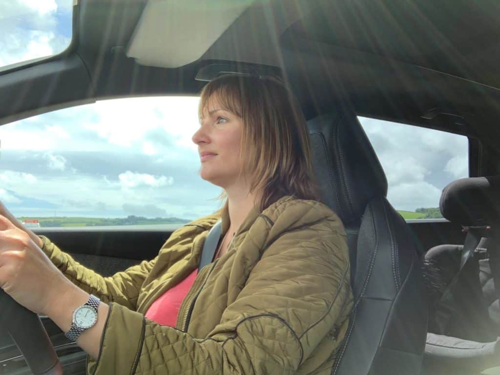 Claire Tin Box Traveller in Peugeot 5008 drivers seat