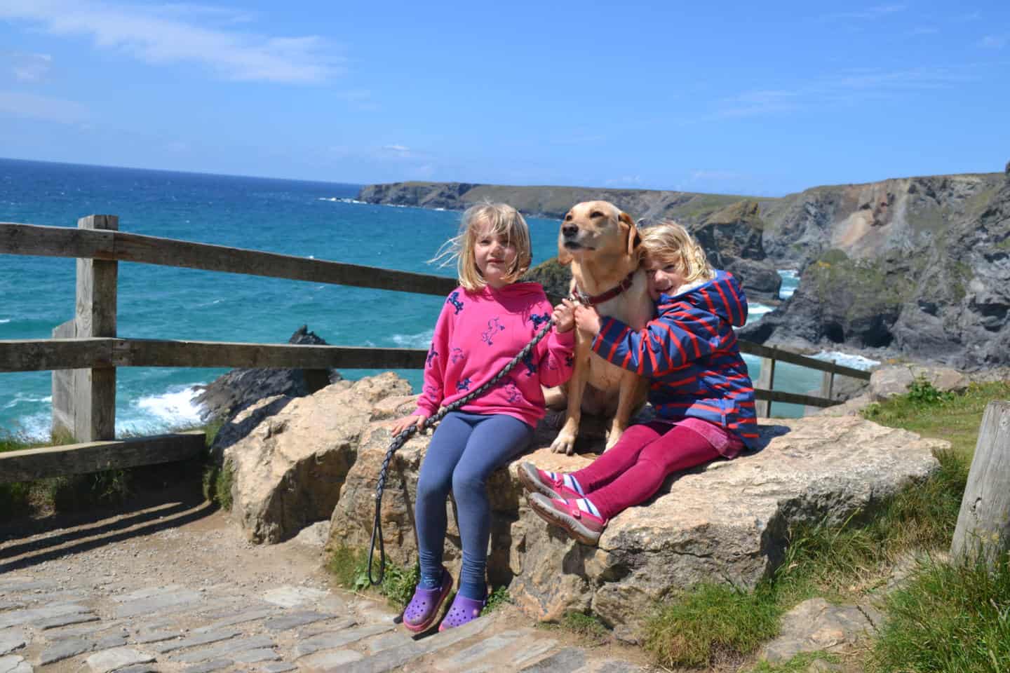 Tin Box girls and Dog at the top of Bedruthan Steps in Cornwall