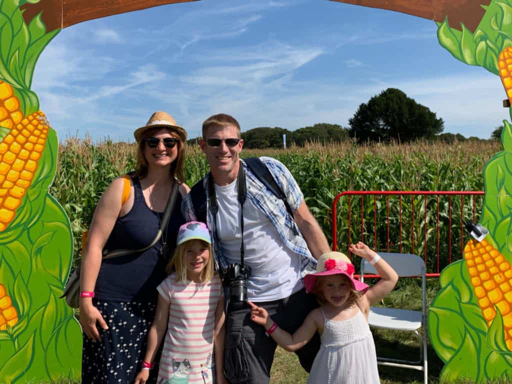 Family at entrance to maize maze at CarFest South 2019
