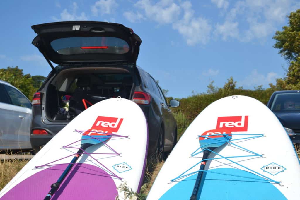 Inflatable stand up paddle boards by car