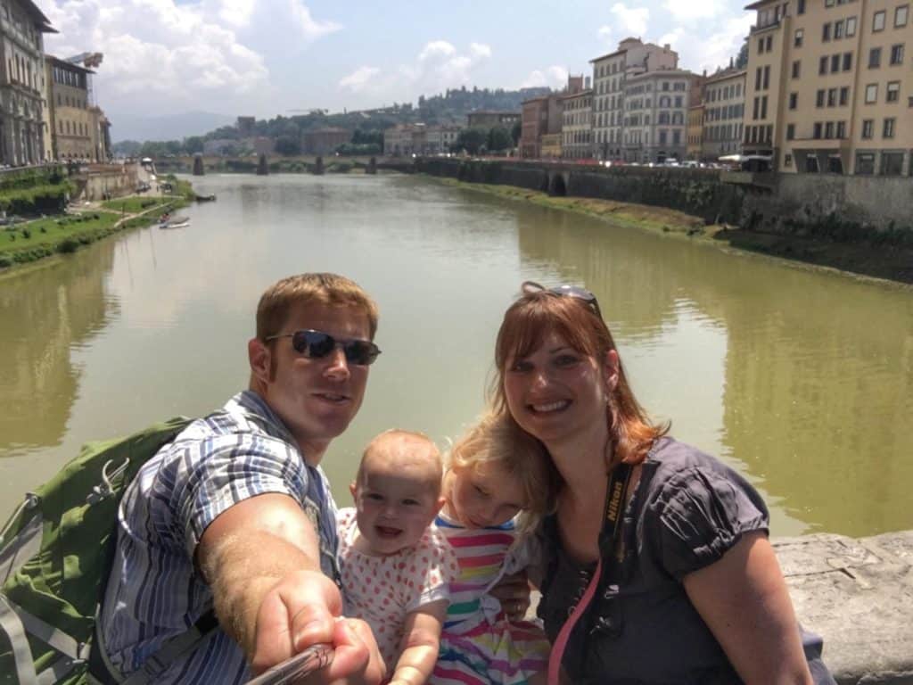 Ponte Vecchio family selfie over River Arno in Florence