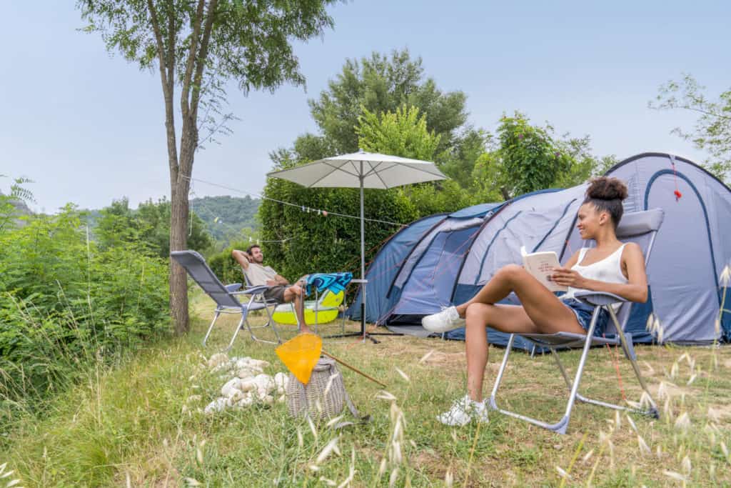 Tent and family on Soleil Vivarais Yelloh! Village campsite camping pitch - camping holidays in Europe