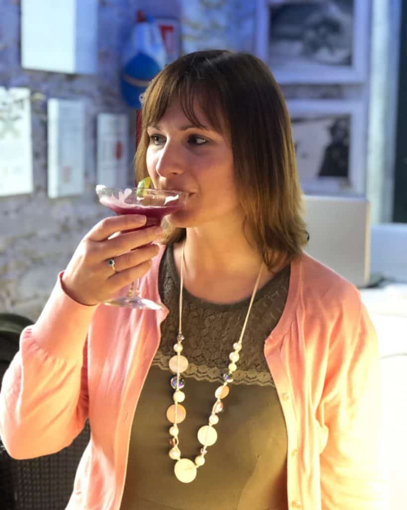 Claire drinking cocktail 