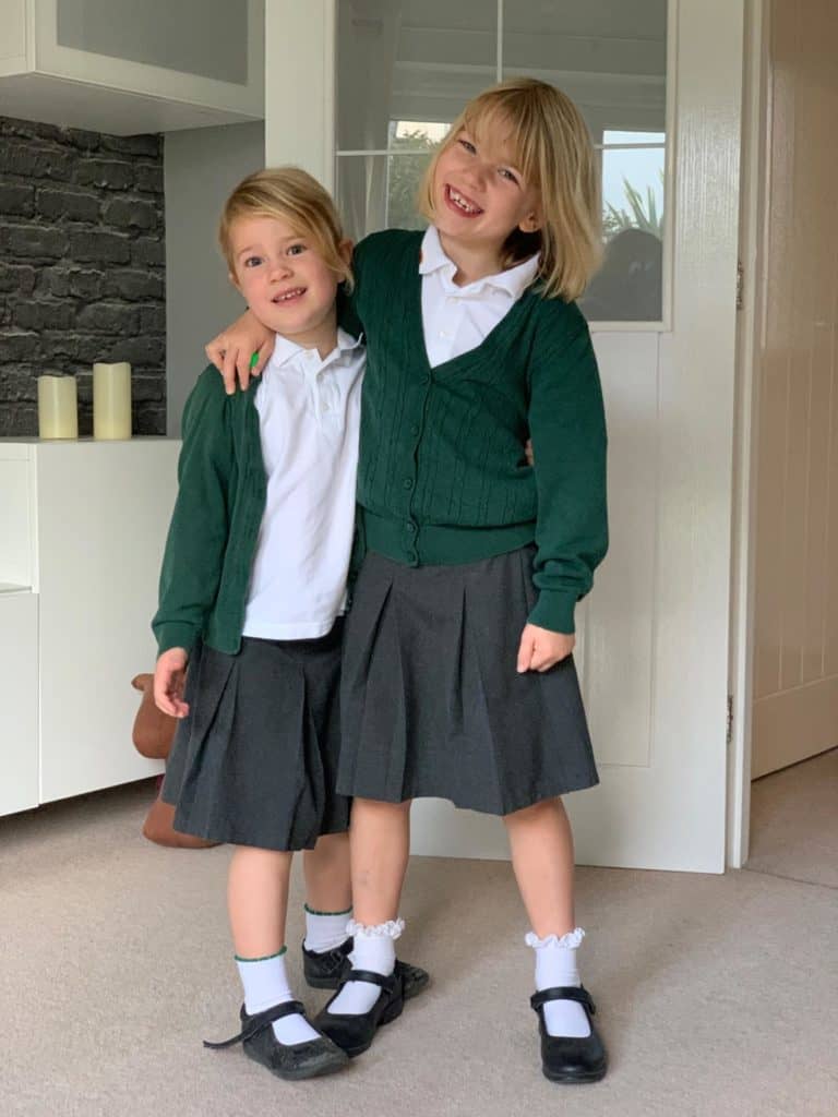 Sisters wearing school uniform