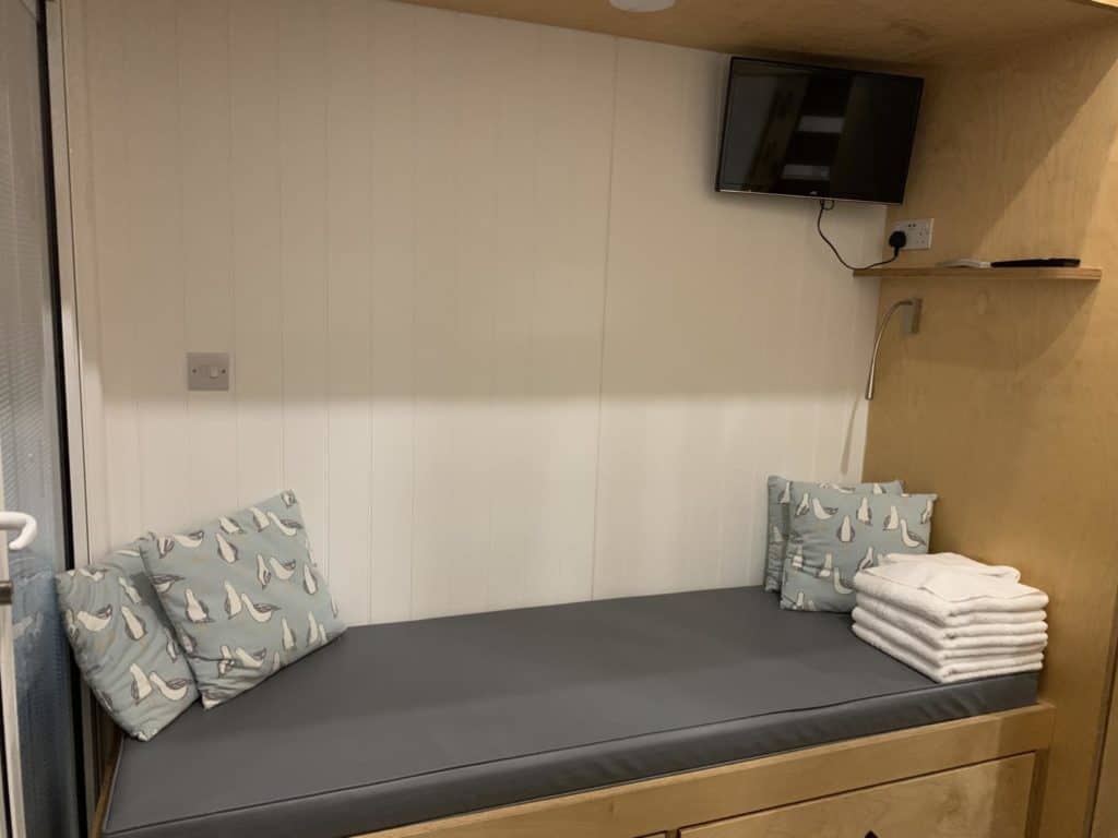 Bench that turns into single bed downstairs in Bournemouth Beach Lodge