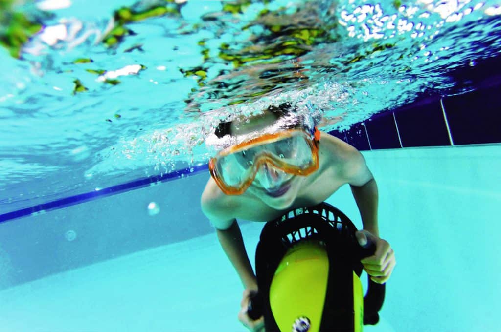 Child doing pool activity underwater at Gwel an Mor