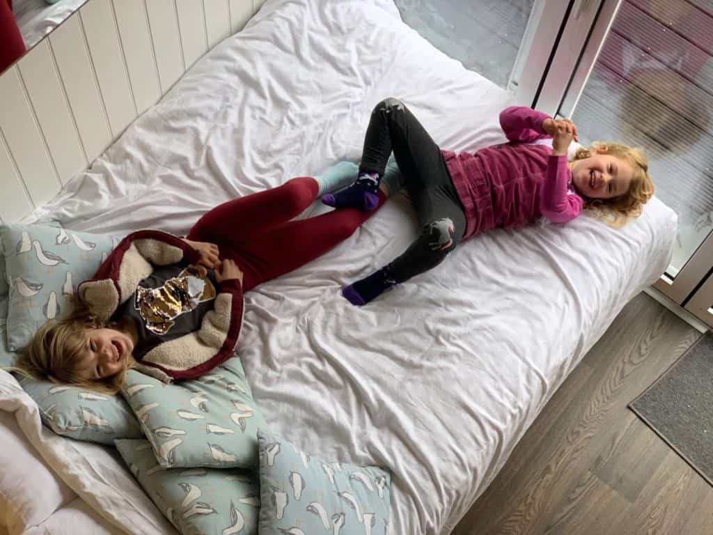 Kids on double bed