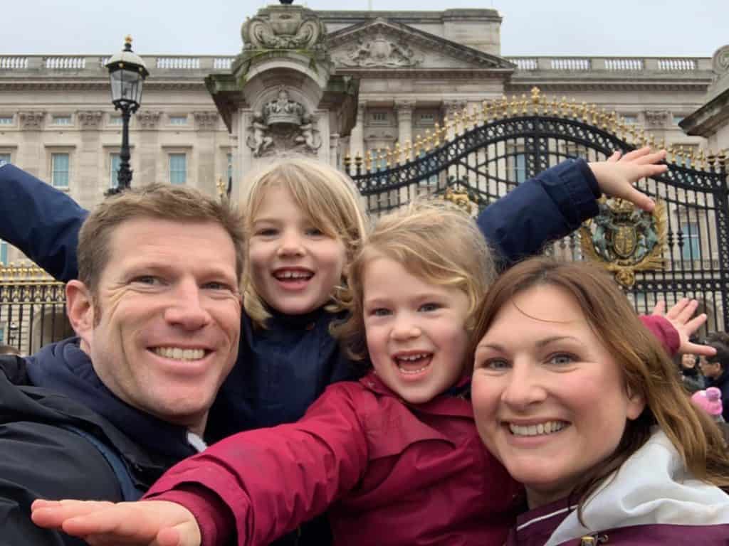 Family selfie outside Buckingham Palace in London