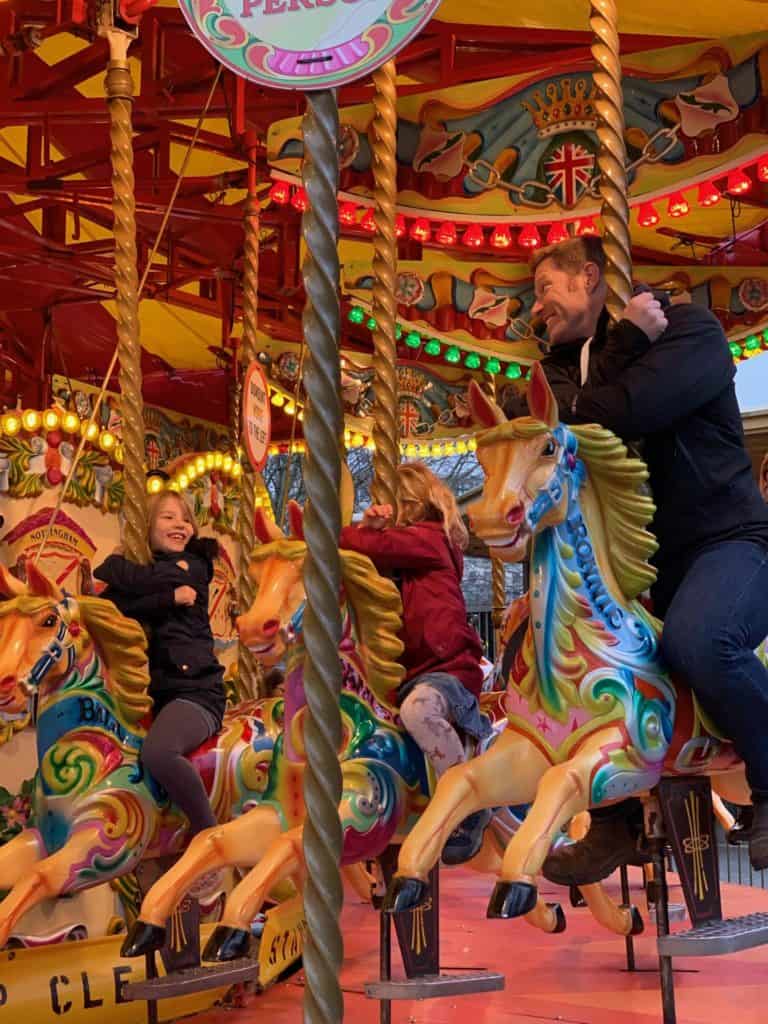 Rinding the Golden Carousel on South Bank in London